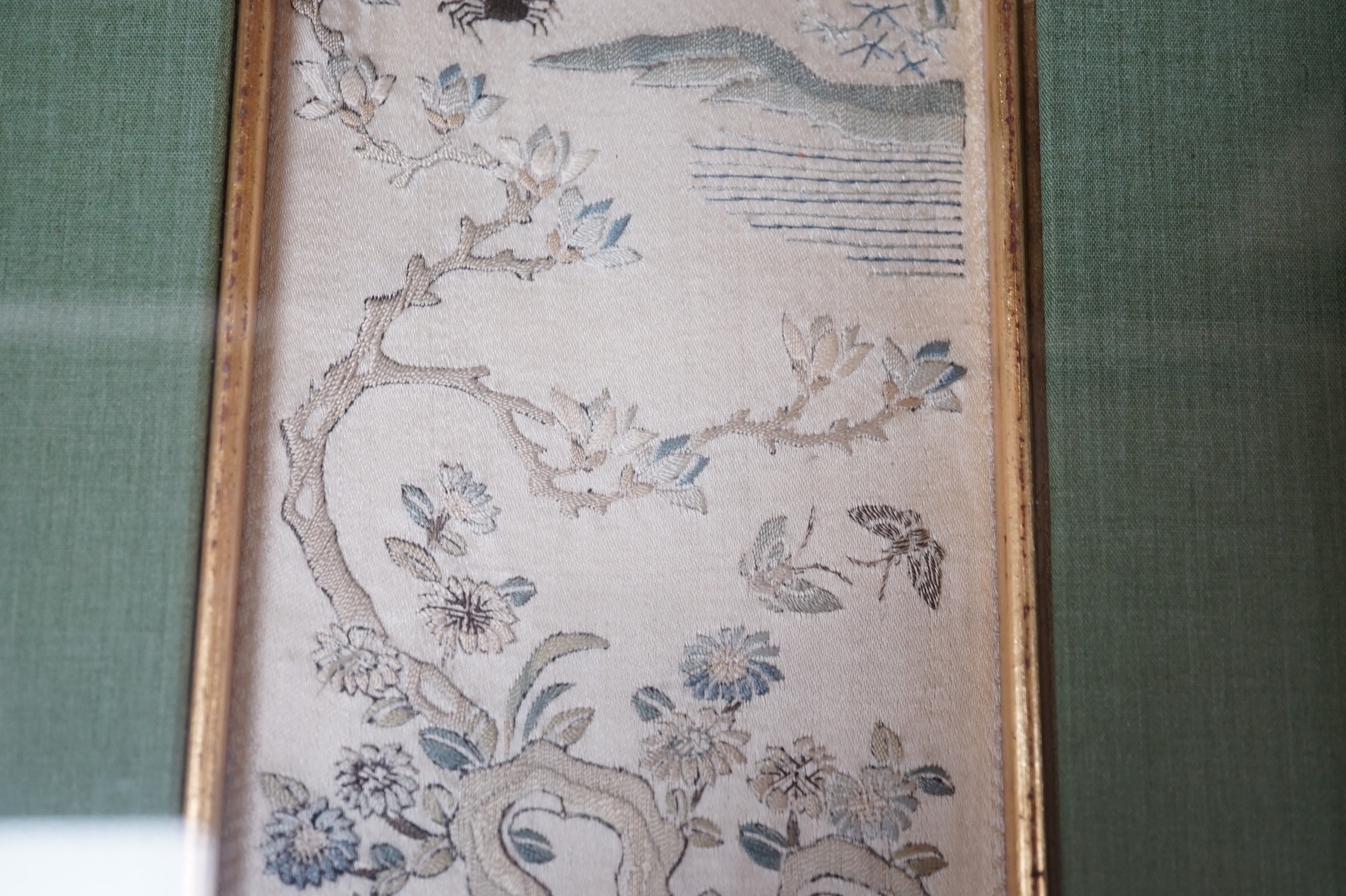 Three pairs of gilt framed, 19th century, silk embroidered, sleeve bands (for Chinese robes), 49cms long x 9cms wide (not including mount or frame)